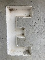 E